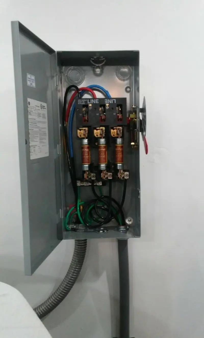 Three-phase disconnect switch installed for Smoke Detector Installation in Eaton