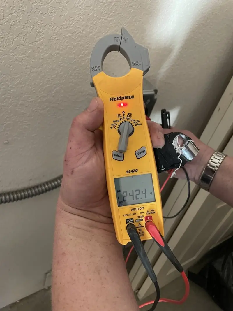 Voltage testing with clamp meter during Circuit Breaker Repair in Eaton
